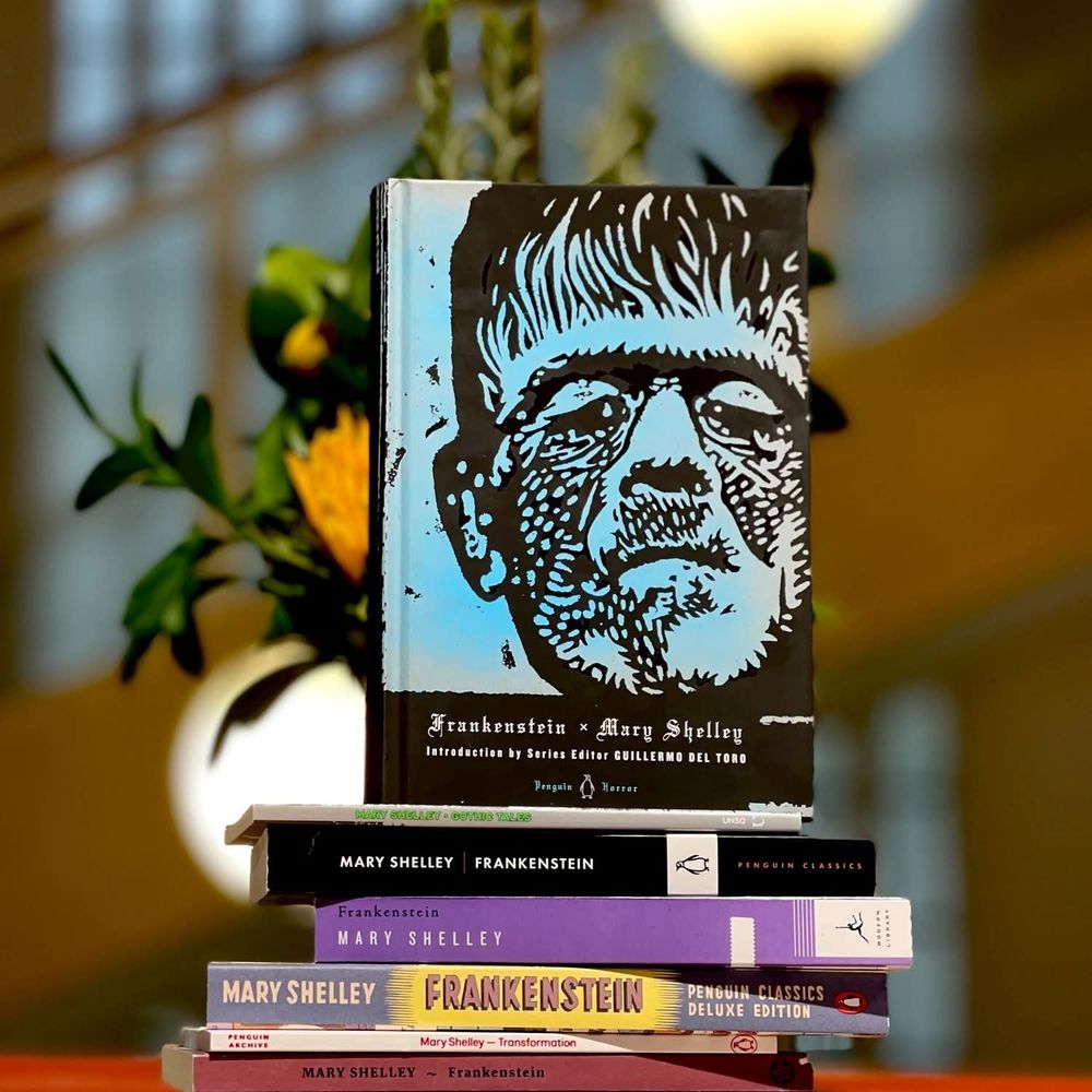 A photo from Waterstones' Facebook showing a stack of different editions of Frankenstein.