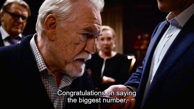Still from Succession with Brian Cox saying, "congratulations on saying the biggest number, you fucking morons."
