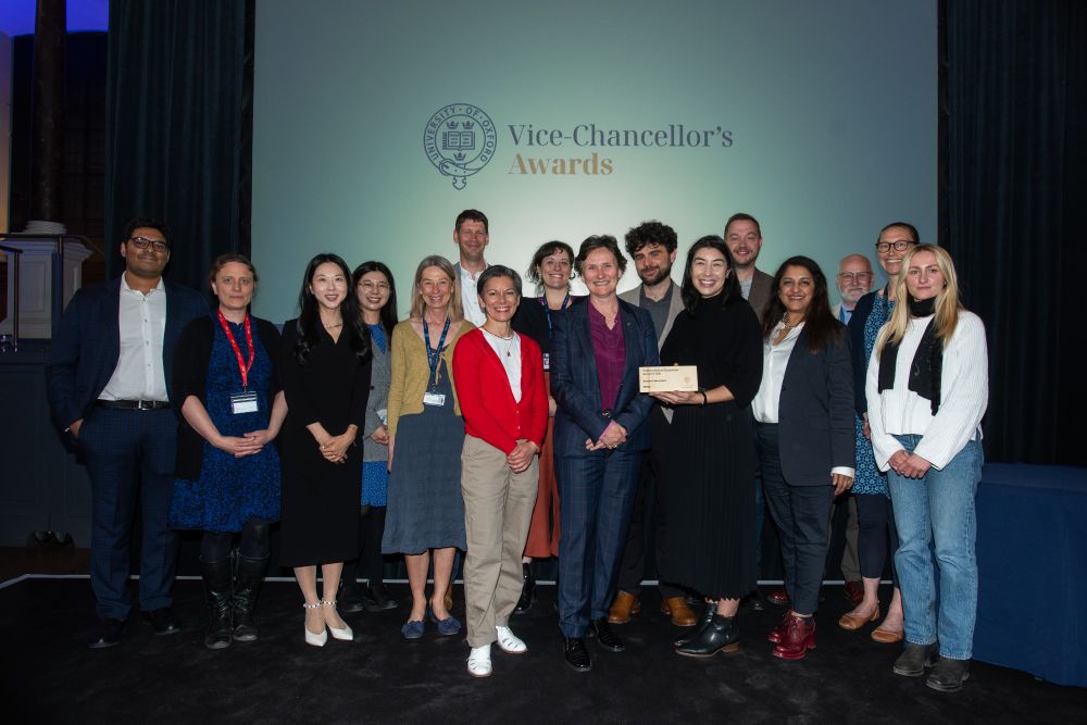 Members of the MedHum project receive their award from the Vice-Chancellor