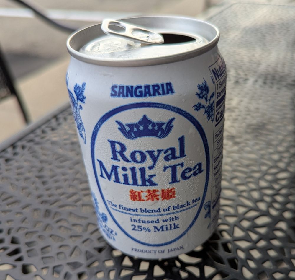 a can of royal milk tea from a sushi and ramen shop