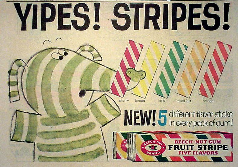 Fruit Strip Gum ad from the 1960s, featuring a cartoon elephant with green strips, along with I've sticks of the gums. red (cherry), yellow (lemon), green (lime), orange (mixed-fruit), and pink (orange).  They may have mixed up the orange and pink ones I the ad. 