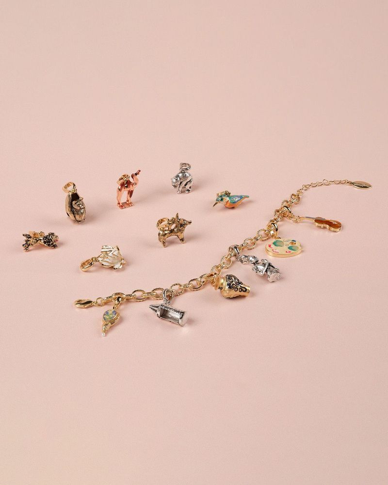 A photograph of the Ashmolean charms range and a charm bracelet