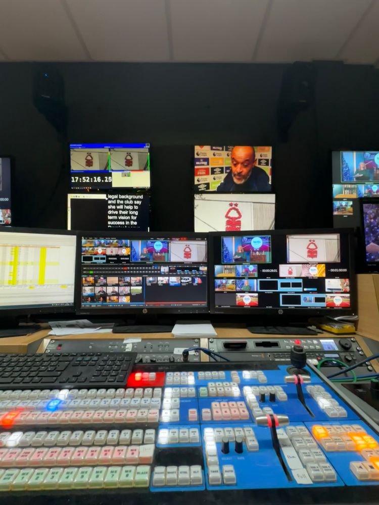 Tricaster TC800 control surface, with a wall of screen showing feeds relating to Notts Today