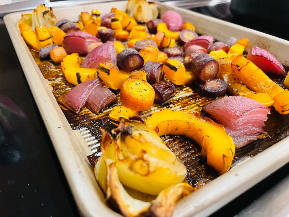Roast veggies:

Quarter (or eighths) a red onion and a fennel bulb, place in roasting pan. Chop three carrots into rounds (I like to leave the skin on), add to pan. Halve and remove seeds/strings from a delicata squash, then slice into half-moon rounds and add to pan.

Coat bottom of pan in equal parts mixture of chicken or vegetable stock, mixed with Marsala, until bottom of pan is just covered. Crack salt and pepper over veggies.

Roast at 350F/175C for ~1:45 (or desired crispiness). I do veggies on bottom rack with duck just above. The liquid layer absorbs into the veggies, and you get a mix of soft interior and crispy edges. All ovens are different, so finding your ideal temp/rack settings may take experimenting.