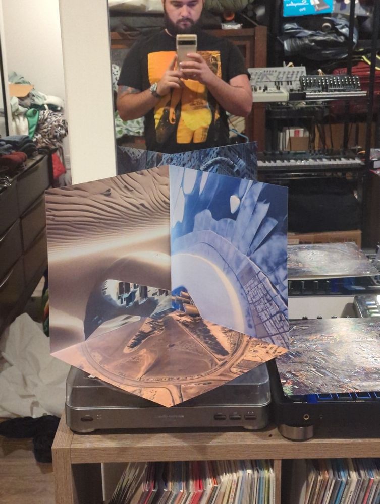 6 panel fold out anamorphic diorama, displaying the aphex twin logo. It is custom packaging for the Blackbox Life Recorder 21f / in a room7 F760 EP