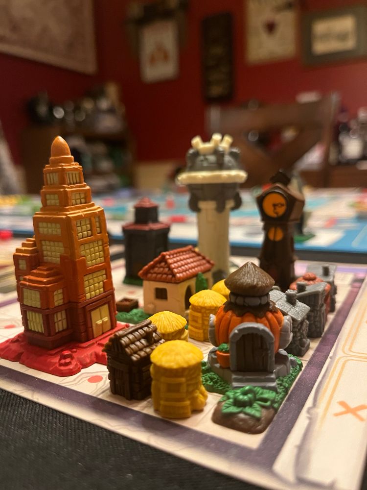 Tapestries - capital city board with a lot of monuments on it. 