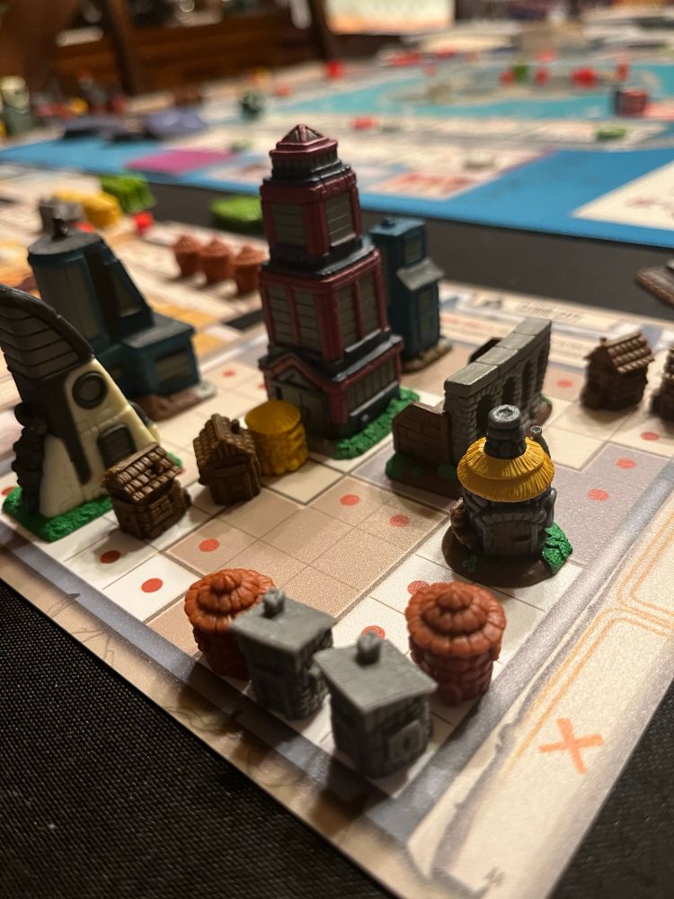 Tapestries - capital city board with income buildings and monuments. 