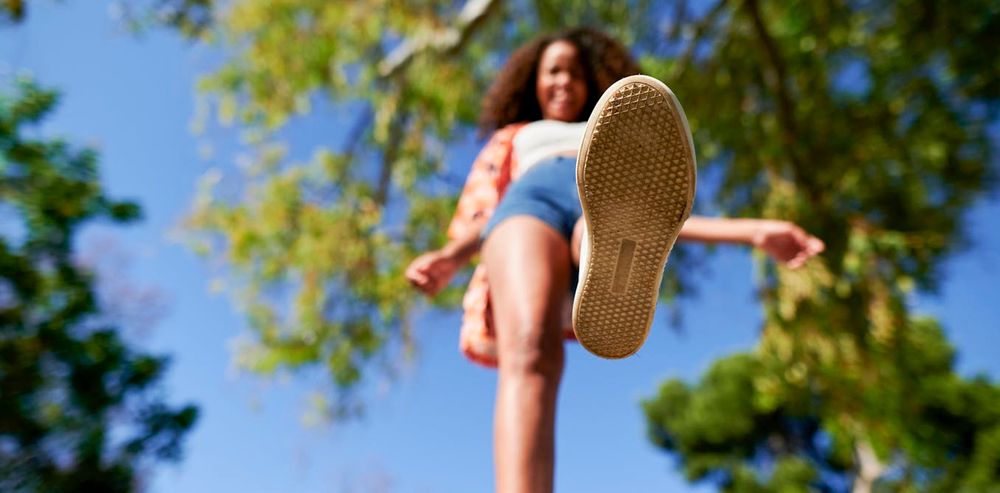 A woman stepping