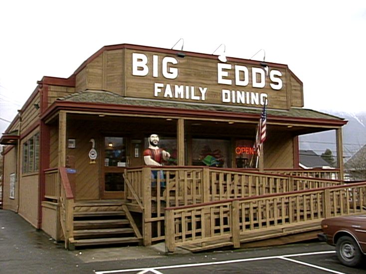 External shot of a wooden building with a prominent sign reading "BIG EDD'S FAMILY DINING"