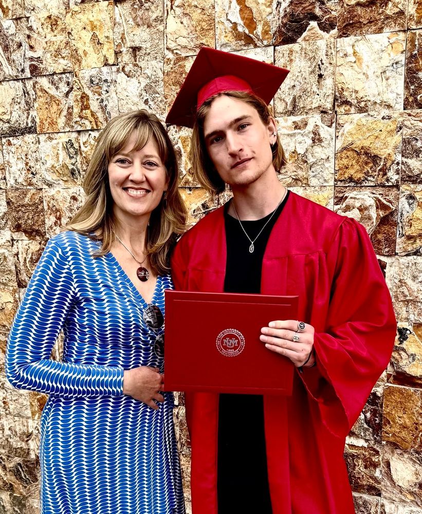 Photo of Julie Heinrich and Carter Heinrich at his UNM graduation.
