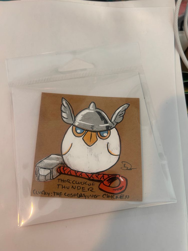 Drawing of a small chicken dressed as Thor.