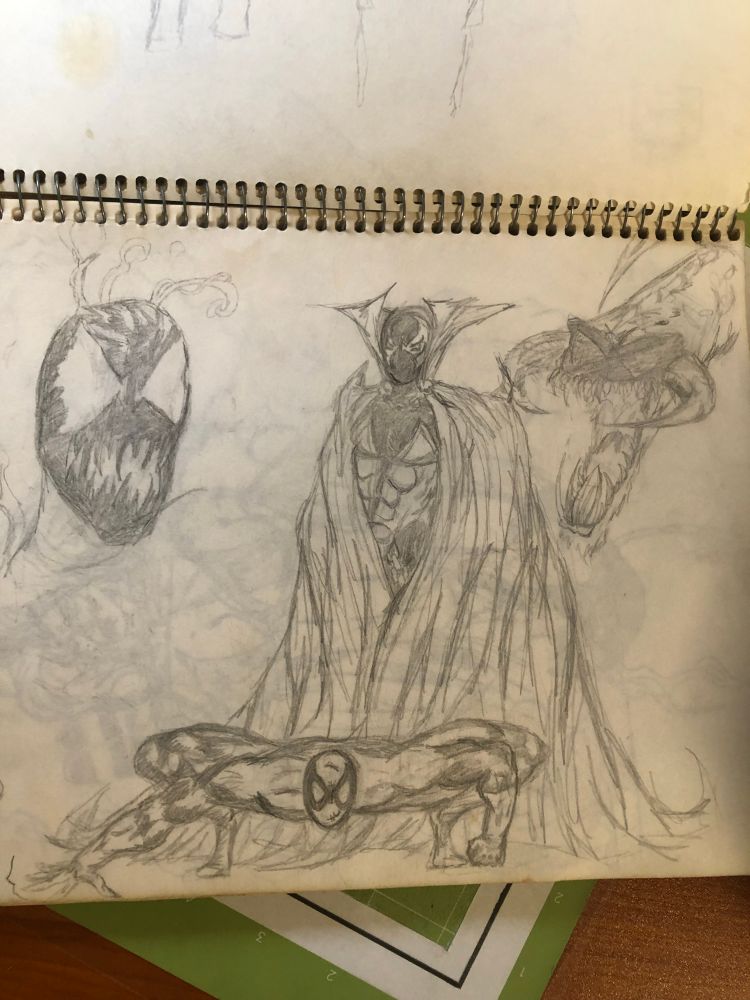 A very old drawing of spider-man and spawn from comics with carnage and violator heads floating at the margins.