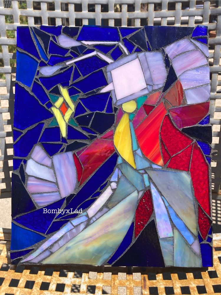 mosaic of a TV headed creature in a red suit, holding out large hands to grasp at a shimmering star