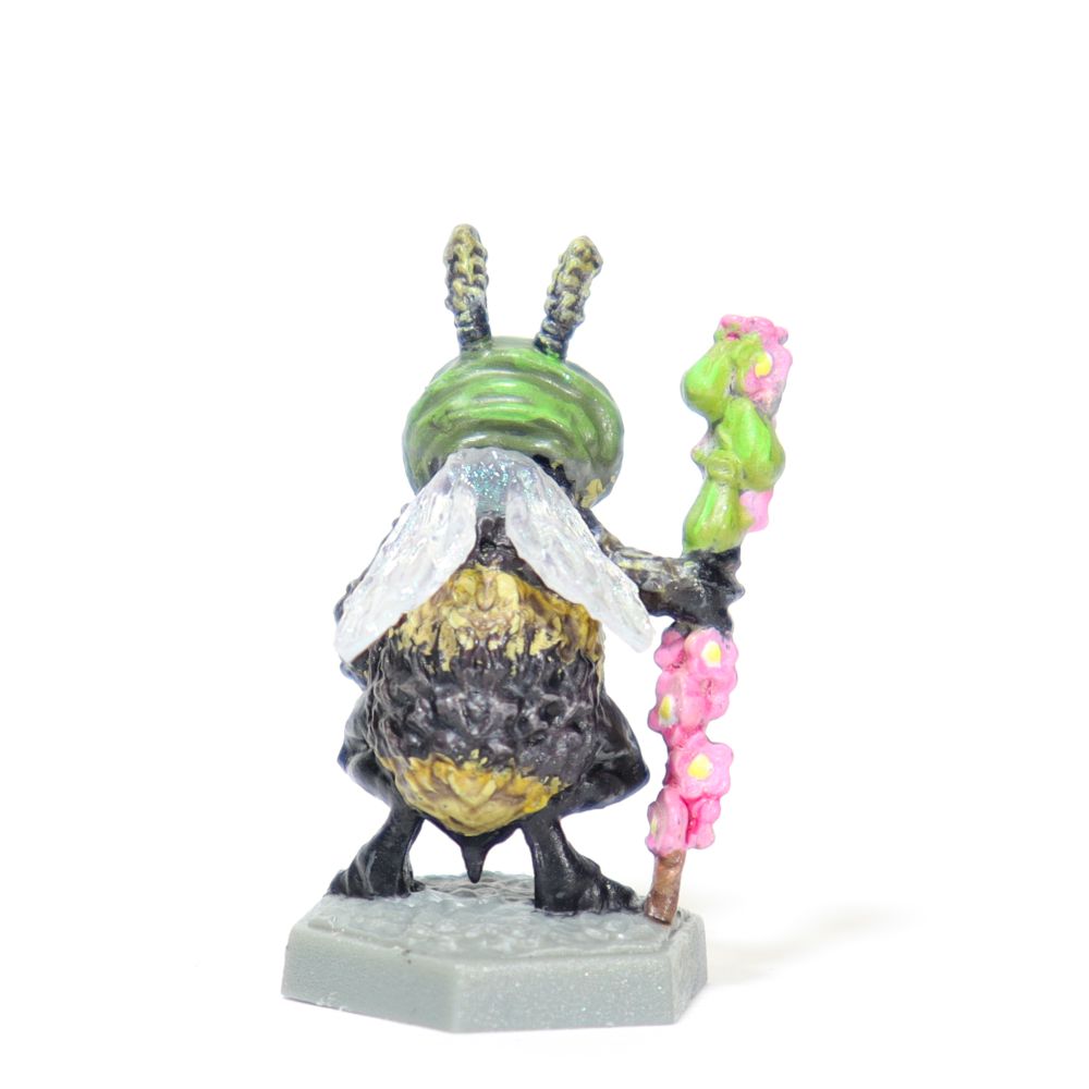 the bee from the back, showing their wings.