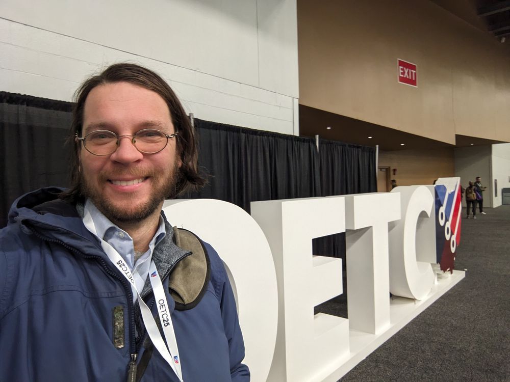 A selfie in front of the sign for the Ohio Educational Technology Conference