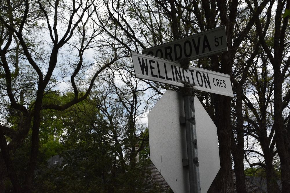 Street sign at Cordova and Wellington. Winnipeg. B&W.
