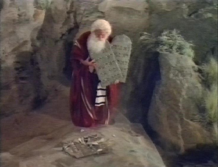 Moses looking down at dropped tablet in Mel Brooks’ History of the World Part 1