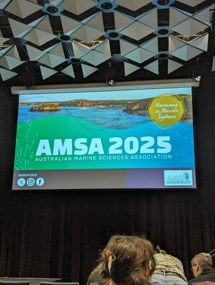 A projector screen showing the opening slide for the Australian Marine Sciences Association conference 