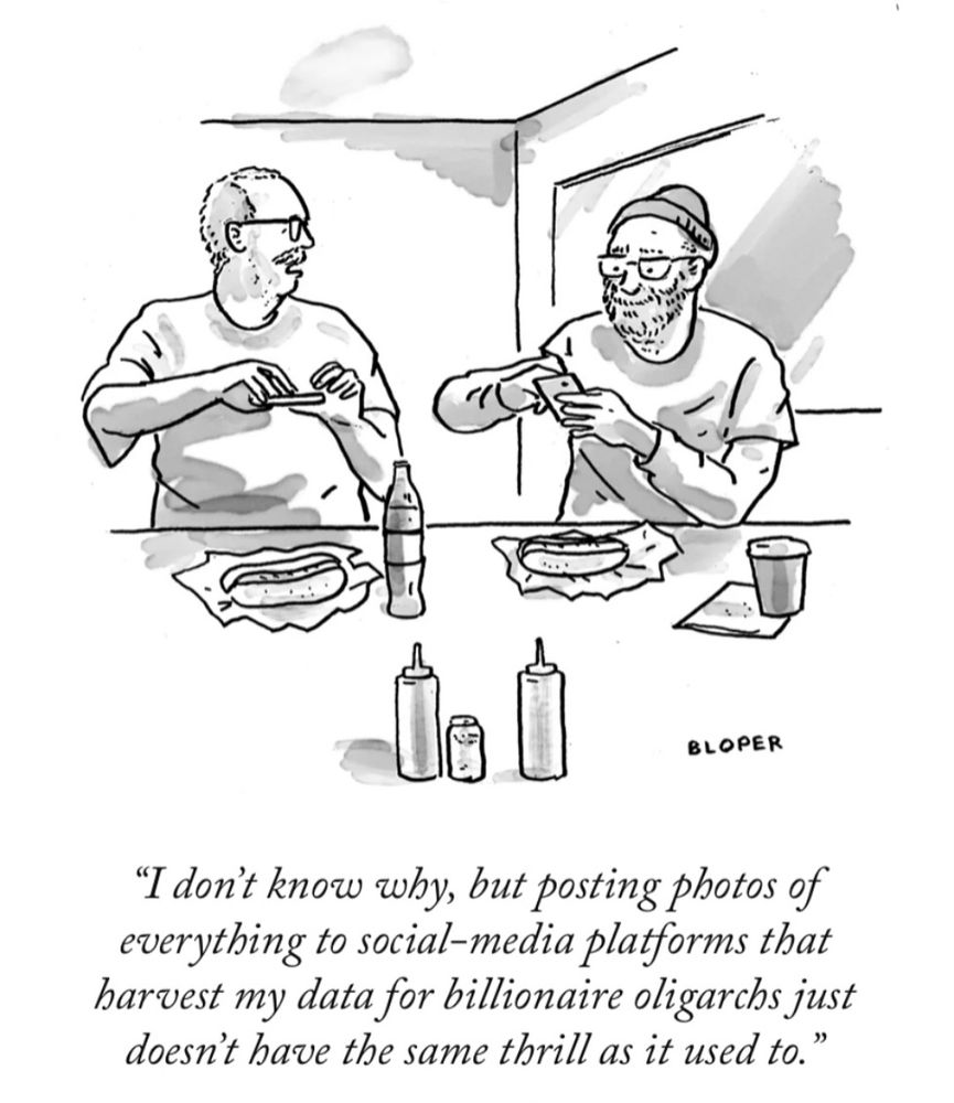 Single-panel cartoon by Brendan Loper for the New Yorker.
Two men scroll on their phones as they sit down to a lunch of hotdogs.
One says:
"I don't know why, but posting photos of everything to social-media platforms that harvest my data for billionaire oligarchs just doesn't have the same thrill as it used to."