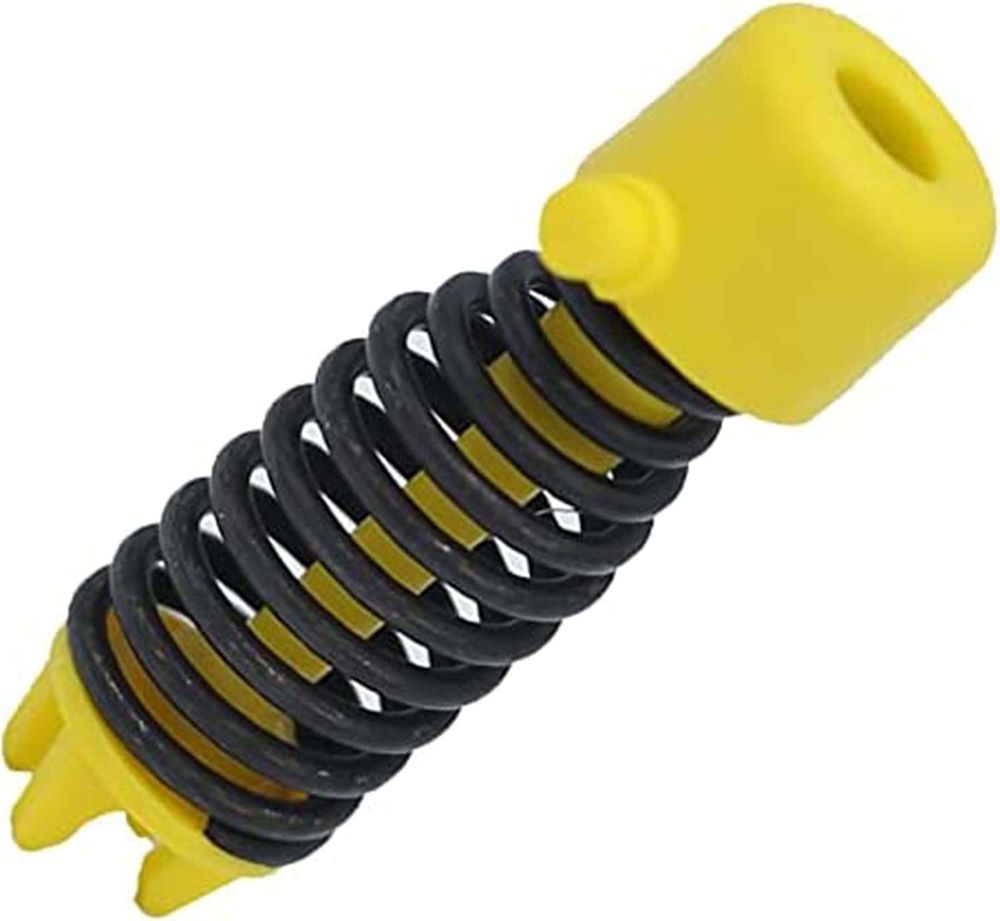 Ford clutch pedal assist spring. Black spring, yellow plastic. Looks a bit like a wasp, and it's just as massive a twat.