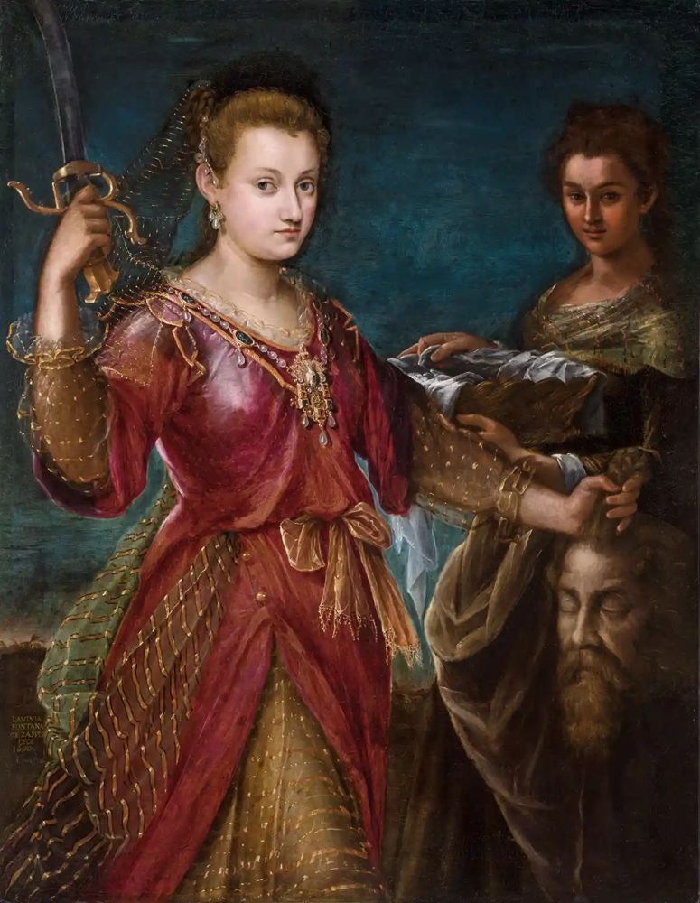 Mannerist painting depicting Judith from the Old Testament gripping a falchion in one hand and the severed head of Holofernes by the hair in the other. She wears a flowing red and gold dress and looks the viewer directly in the eye.