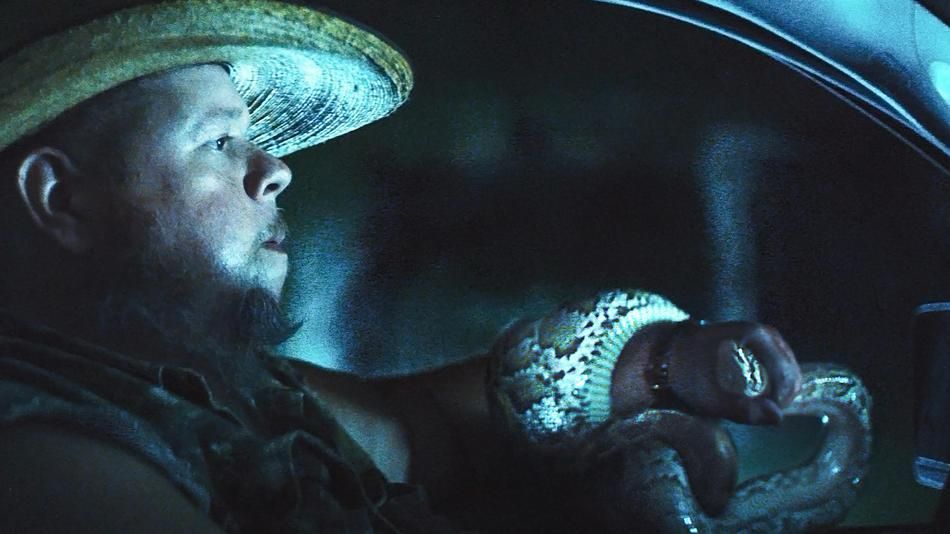 A snake hunter on the hunt in Xander Robin’s SXSW 2025 special jury award winning documentary “The Python Hunt” 