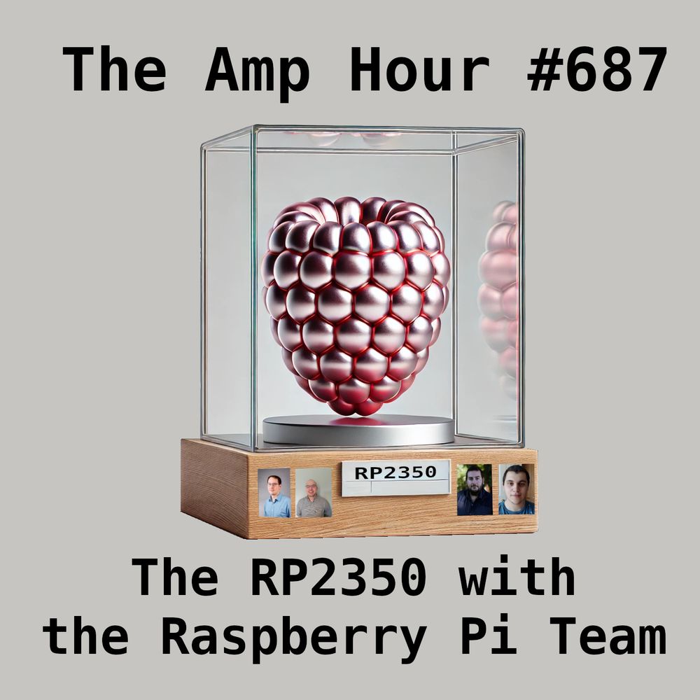 A metalized rasbperry in a glass case, with the label RP2350. There are pictures of 4 team members on teh front of the case.