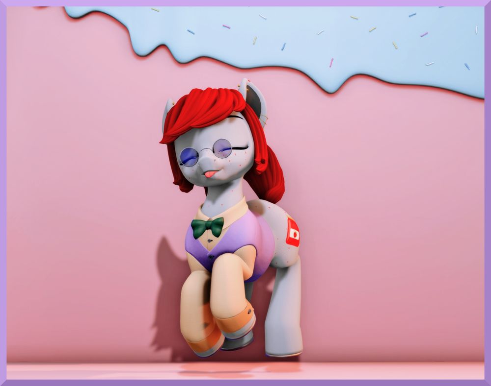 Strawberry Jam in his suit, dancing in front of a wall with dripping frosting and sprinkles behind him.