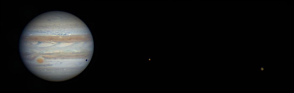 Jupiter with Great Red Spot, Shadow Transit, and Two Moons