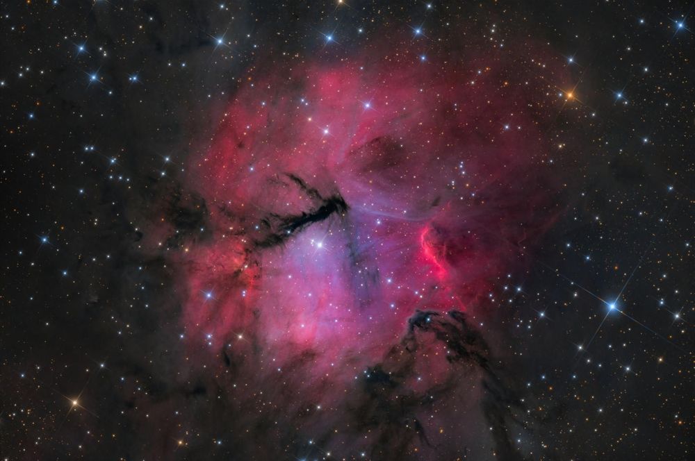 Gum 15 Cosmic Cradle of Stellar Fire