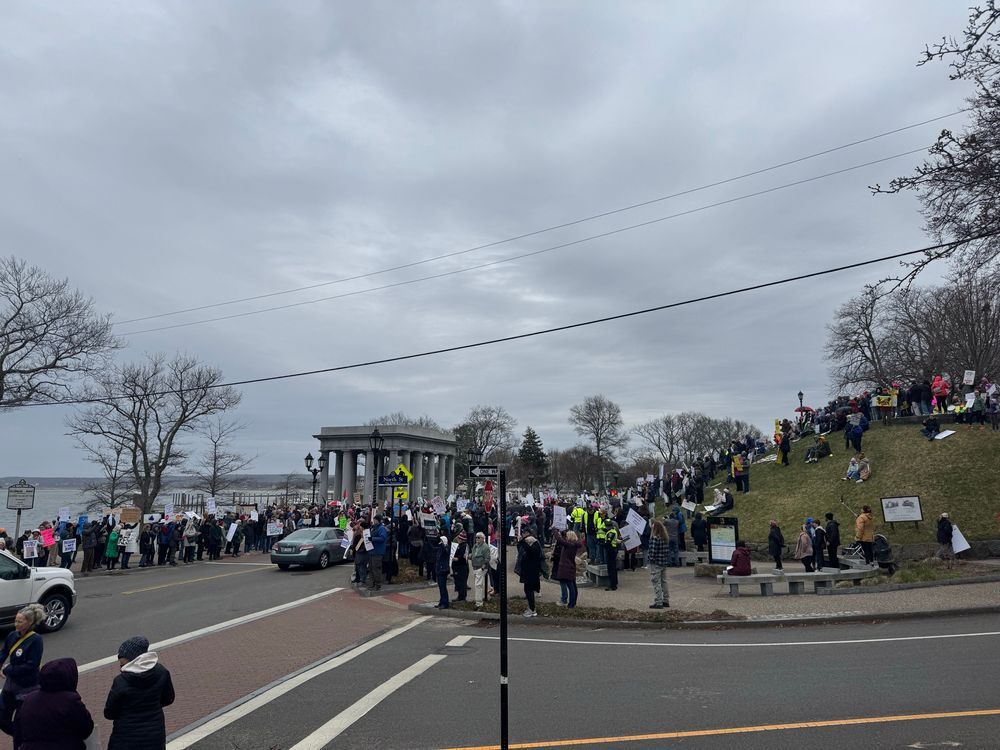 Image of protesters at Plymouth Rock