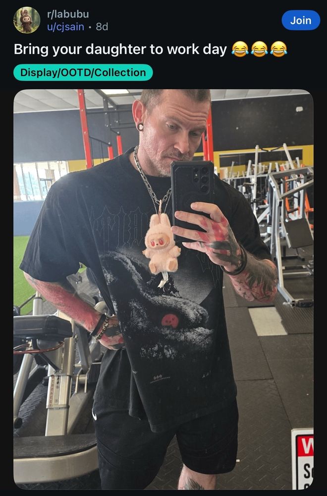 Caption: Bring your daughter to work day 😂😂😂

Picture: man taking a gym selfie with a labubu hooked to his necklace