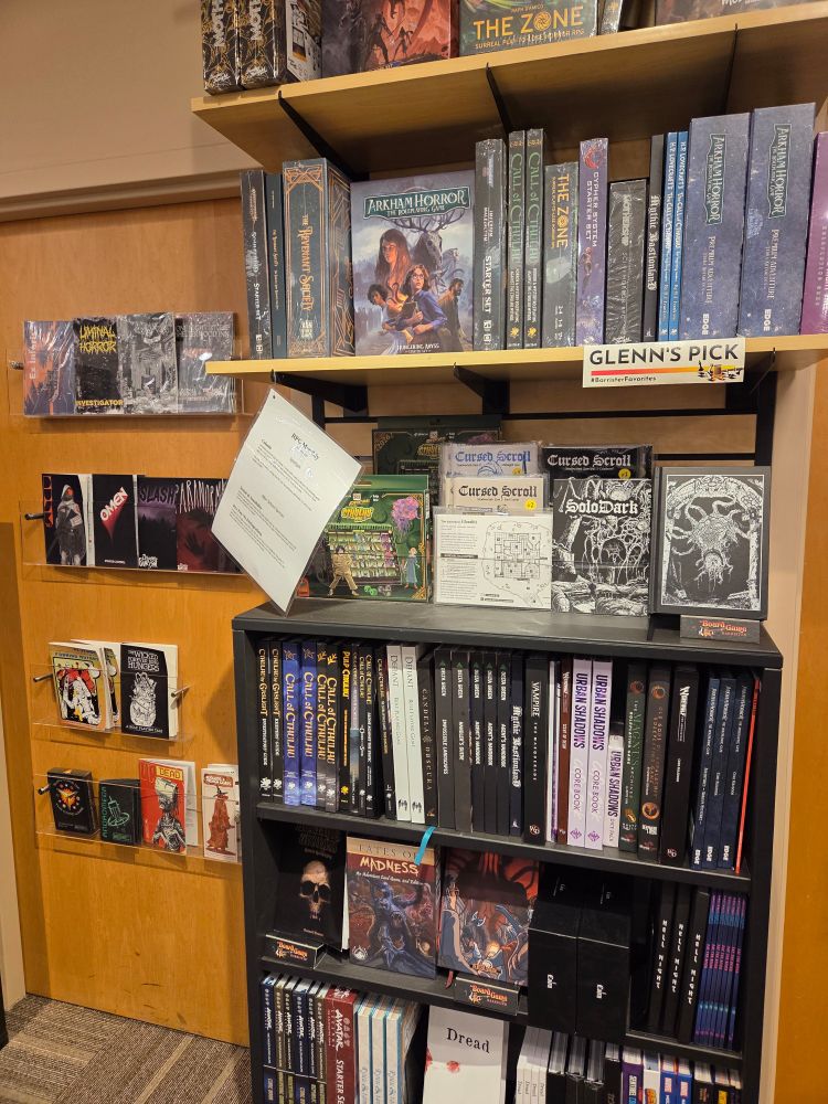 TTRPG books on shelves