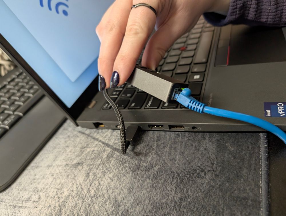 A USB-C Ethernet adapter next to a built in one