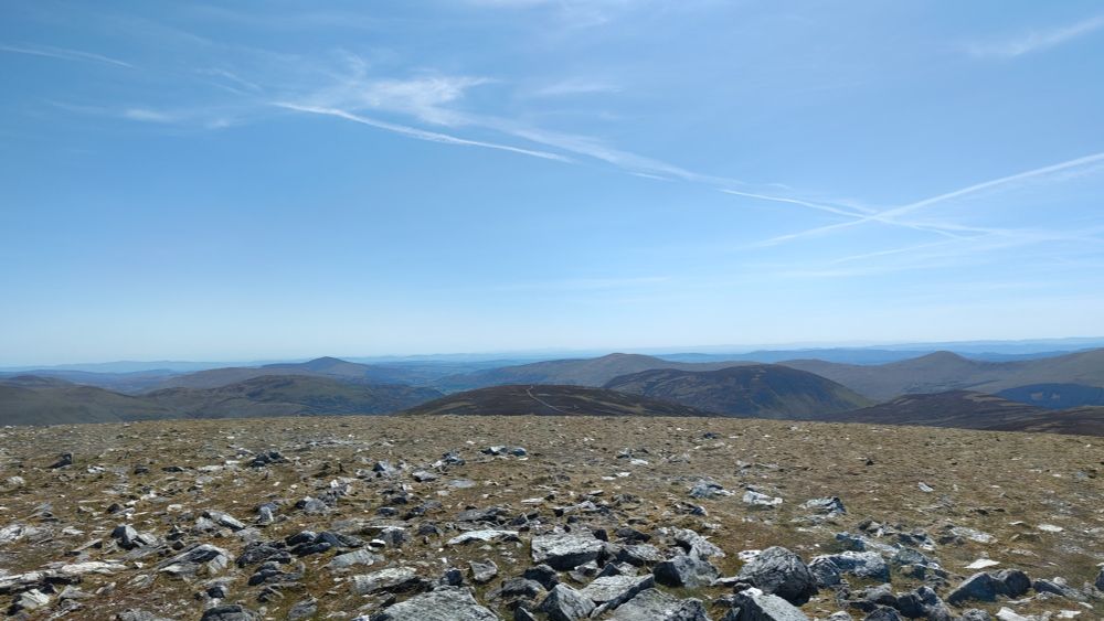 Photo from the top of a hill on a sunny day