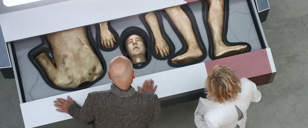 Picard looking at the dismantled body of b4