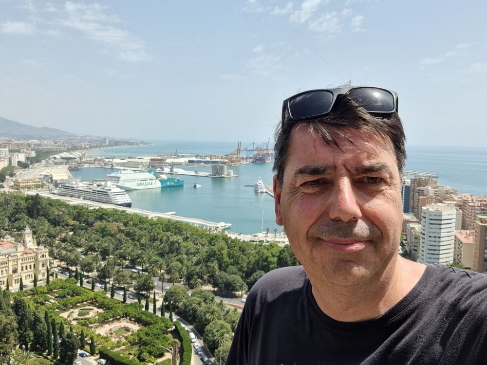 Me with harbor of Malaga in background 