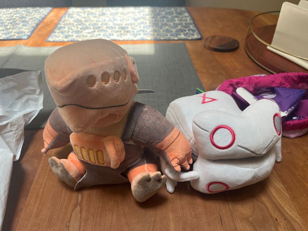 plushies of the spirits forge and eightfold from the webcomic paranatural