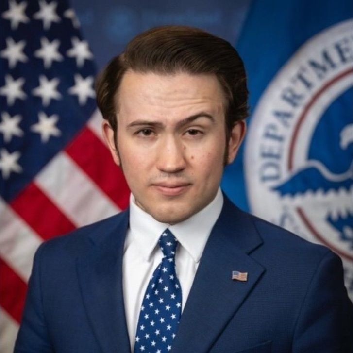 DHS Portrait of Thomas Fugate. What are his eyebrows doing?