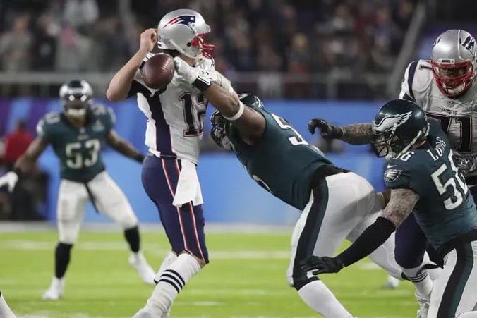 THEE Brandon Graham with a strip sacking on Tom Brady in Super Bowl 52. 