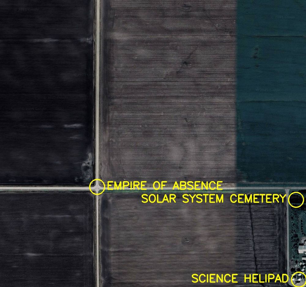 Aerial satellite photo labelled in bright yellow letters: 

1. Empire of Absence
2. Solar System Cemetery
3. Science Helipad
