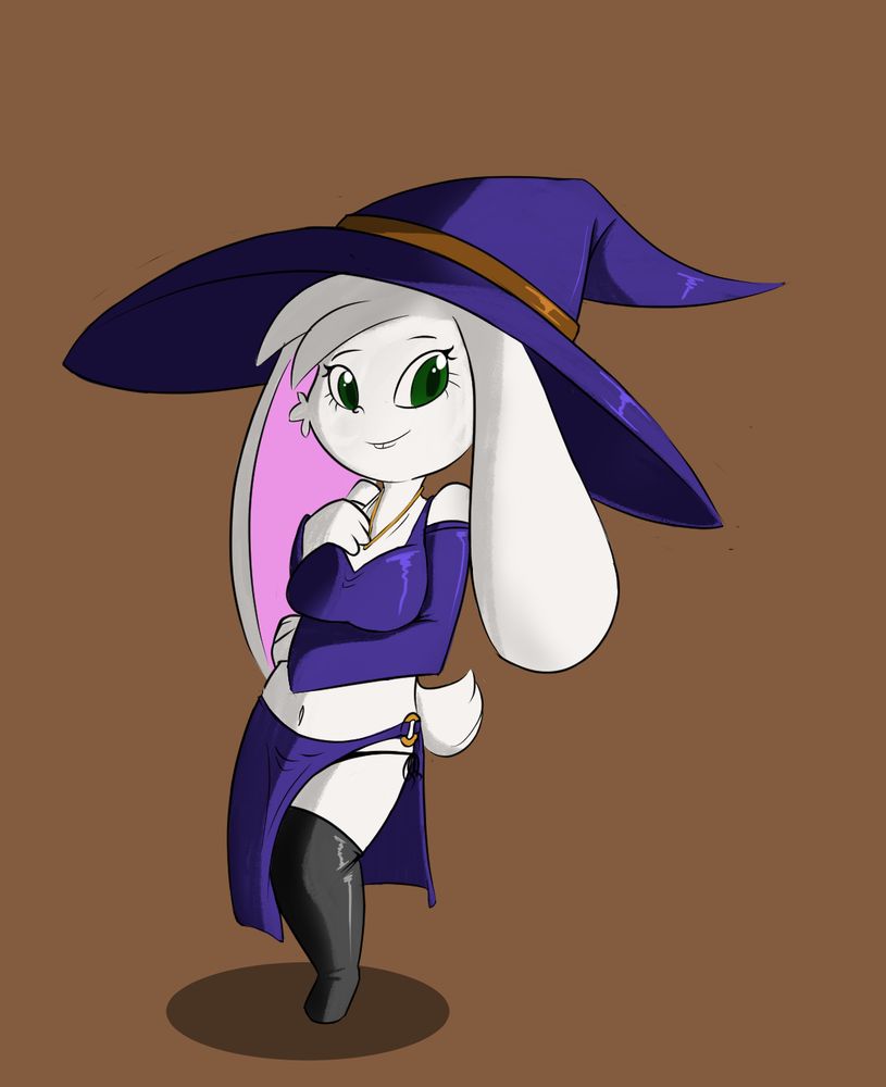 A rabbit lady in a witches outfit