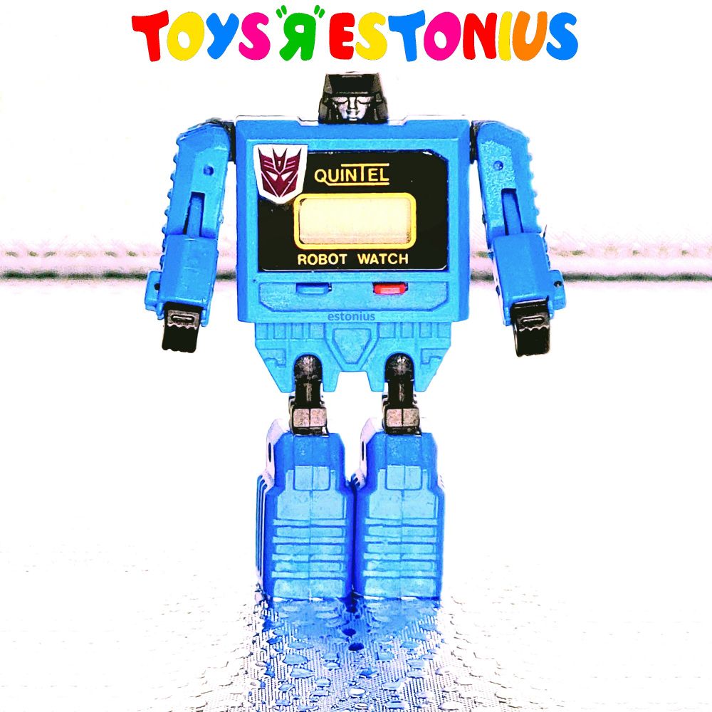 A wee bit o' kitbash fun I had with a salvaged 1983 Takara Micro Change MC-06 Watch Robo head, a more fully-articulated 1985 Quintel bootleg/knockoff robot watch body, and a bootleg/knockoff die-cut foil Transformers' Decepticon insignia decal.

With Soundwave being my favourite Transformer, the vintage bootleg/knockoff blue robot watches always really reminded me of him.

So, this was my way of making another one of my vintage bootleg/knockoff blue robot watches look even more like an official Transformer.

Takara's Micro Change MC-06 Watch Robo was invented by 松田 隆志 Takashi Matsuda in 1983.
