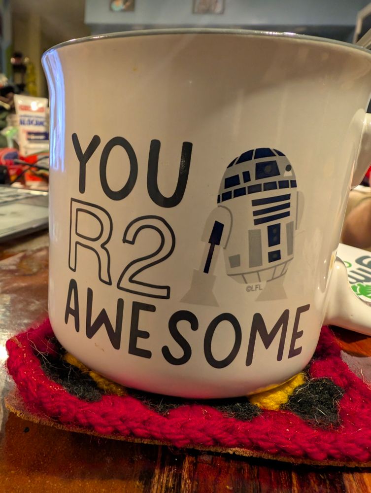 You R2 Awesome mug with a image of R2D2 on the mug next to the text