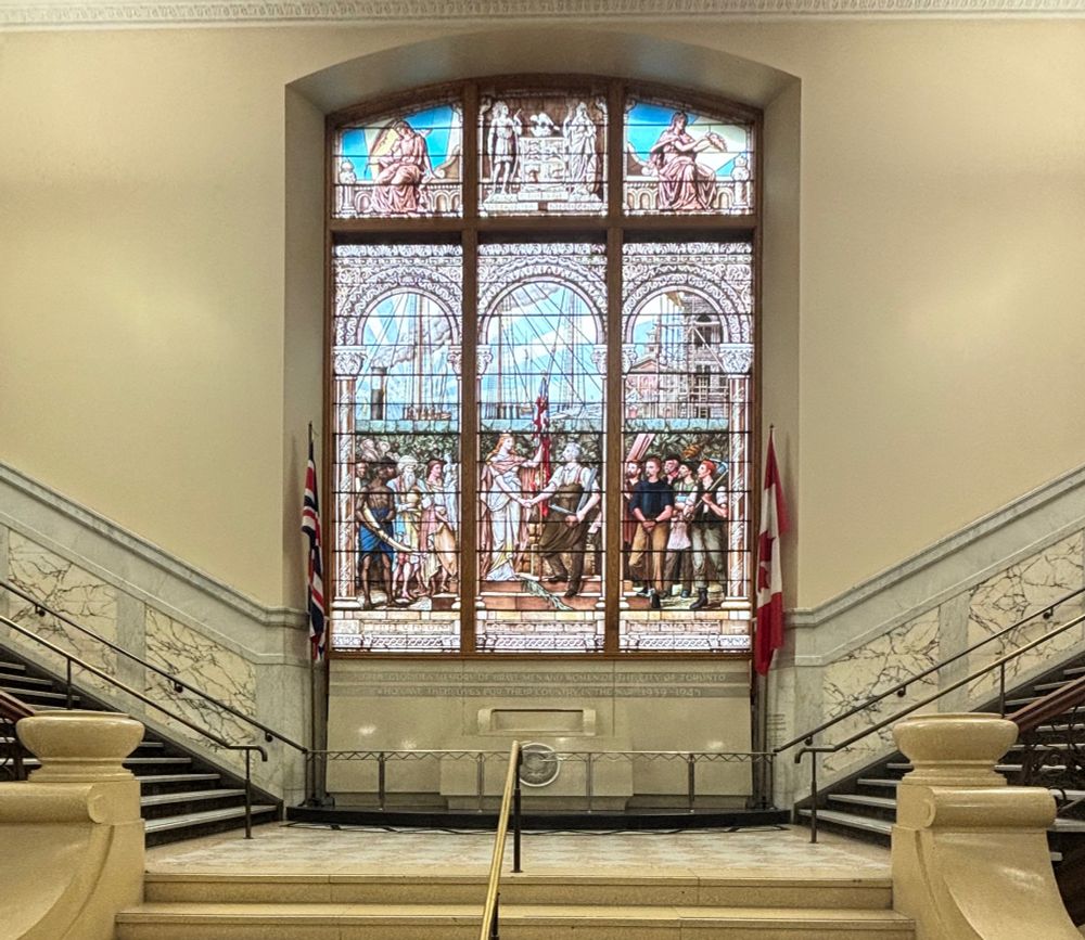 View of a Stainglass window, depicting an allegory of the City Of toronto