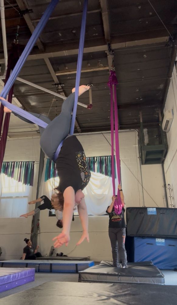 Person person L pop pose in aerial hammock/sling 