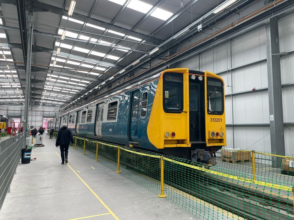 Class 313 train in blue and grey livery