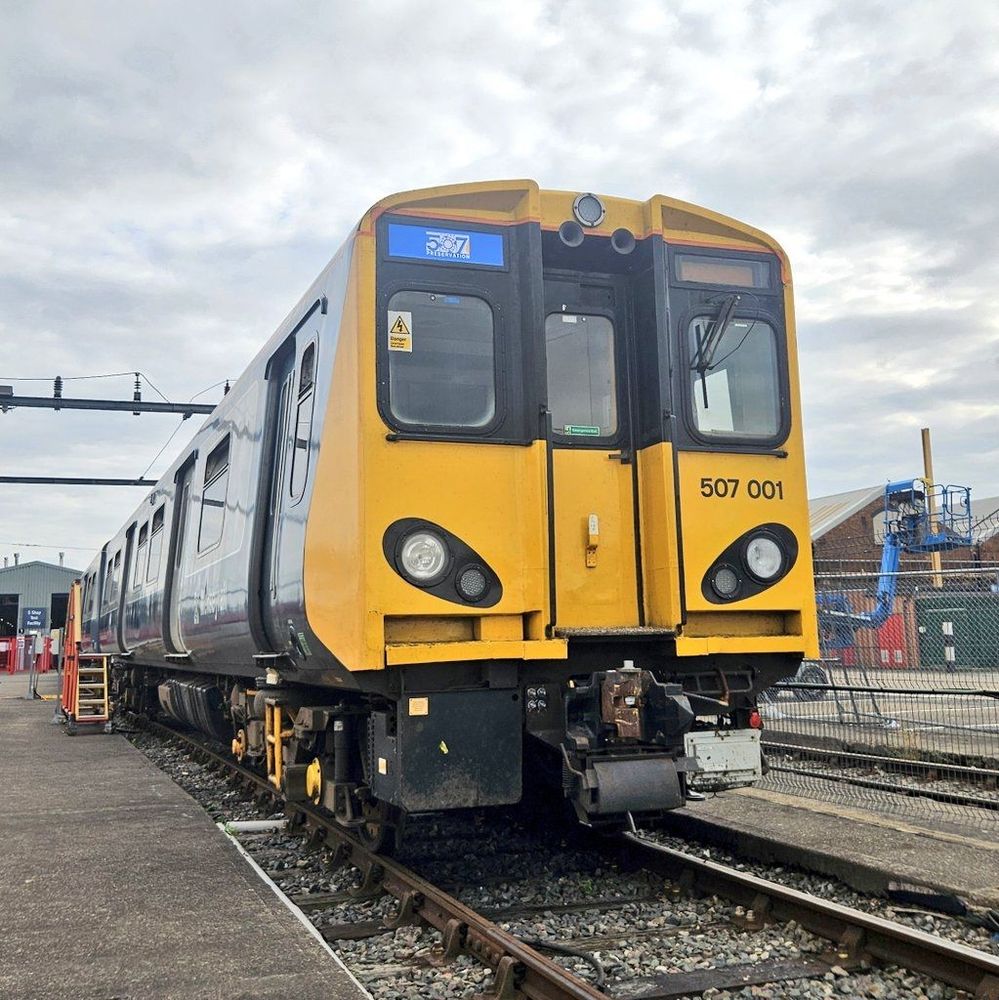 Second view of 507001 showing newly cleaned underframe equipment and C507PS logo sticker.