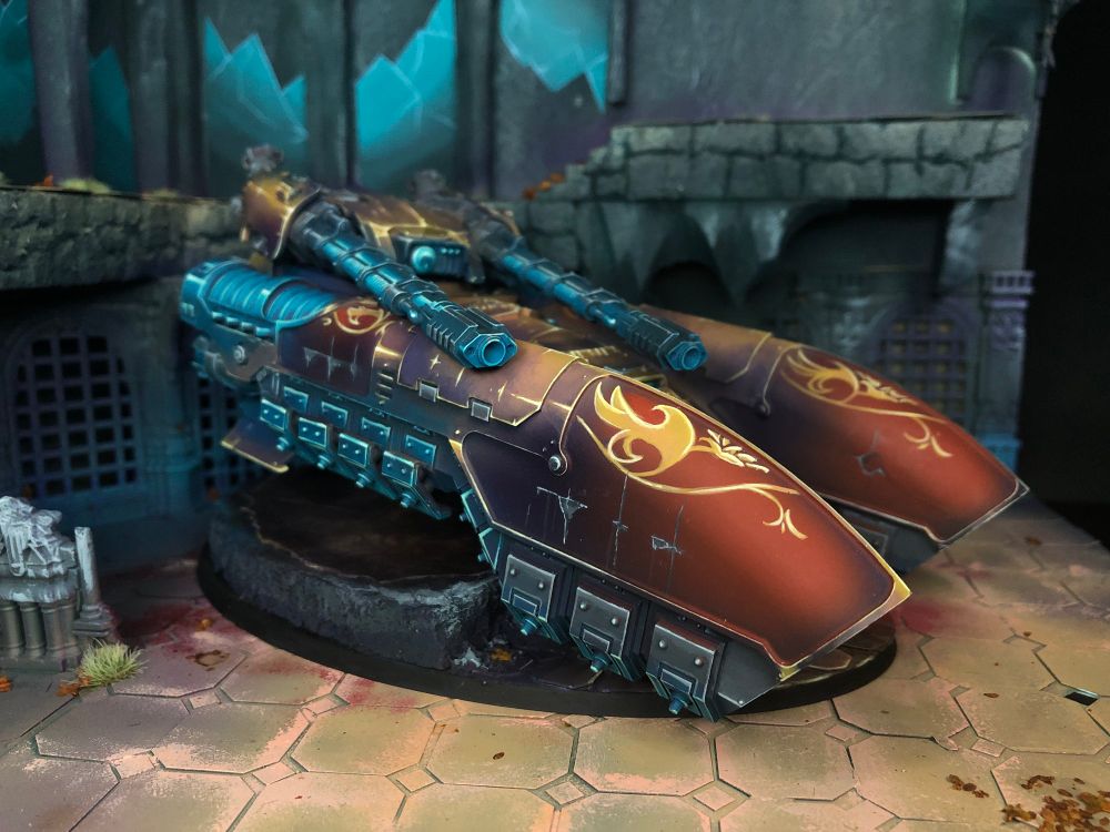 Painted Custodes Caladius Grav-tank on display board.