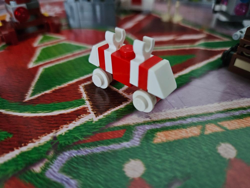 Candy cane coloured mouse droid. Squeak squeak